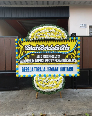 Papan Bunga Duka di Sukadamai